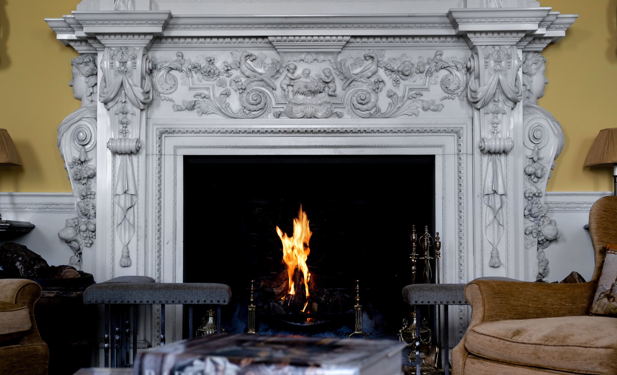 Fireplace within Kirtlington Park, a Grade 1 listed English Country House available for private hire, corporate events and weddings